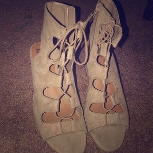 Cute low heeled wedges with holes and laced up